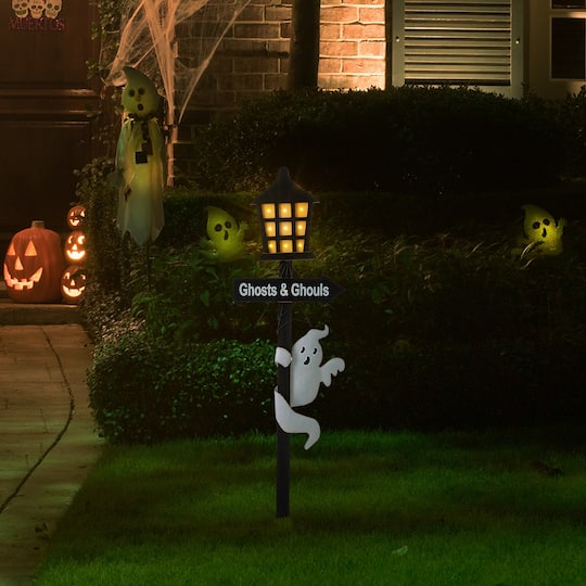 Glitzhome® 42" Lighted Halloween Haunted House Yard Stake with Timer